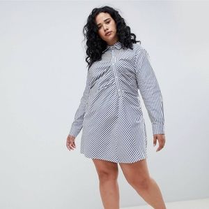 Blue and white striped dress long sleeve with buttons dress hits to the knees.